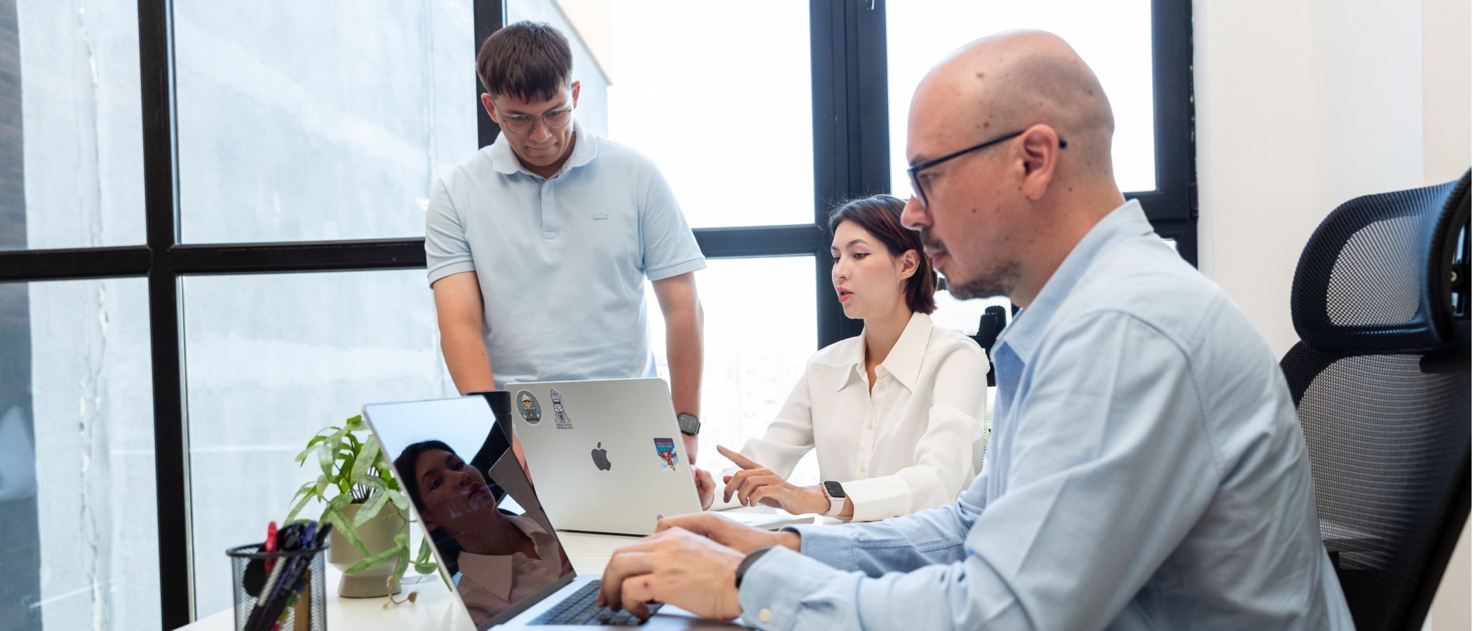 Technical Writer discussing project details with a team member